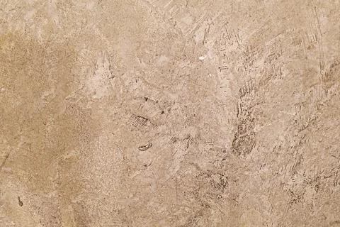 Light brown textured stone interior background with copy space Stock Photos