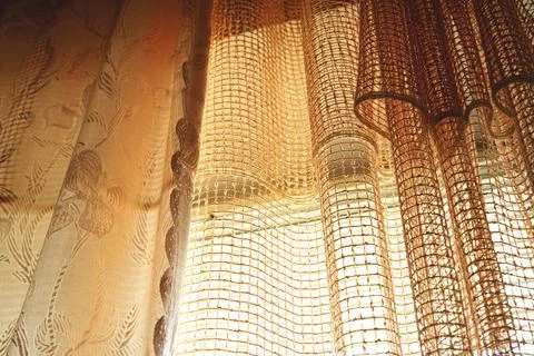 Light brown woven wallpaper texture with fiber pattern. Stock Photos
