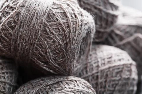 Light brown yarn made of natural sheep wool. Stock Photos