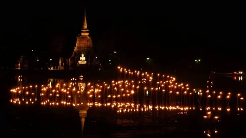 Light in Buddha Statue at Temple in Loy Kratong Festival Stock Footage 69925998