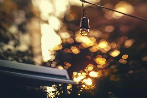 Light bulb and bokeh background Stock Photos