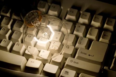 Light Bulb and Computer Keyboard 스톡 사진