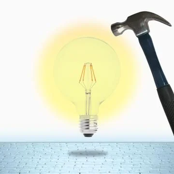 Light bulb and hammer Stock Illustration