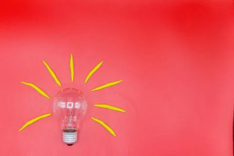Light bulb background red clay Stock Photos
