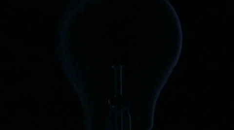 A light bulb being switched on Stock Footage 11333853
