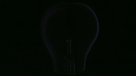A light bulb being switched on Stock Footage 11333881