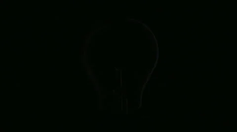 A light bulb being switched on. Video stock 51827915