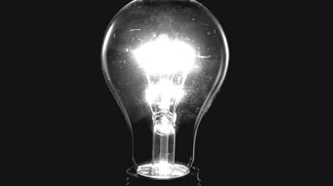 Light bulb on black background. Video stock 54937290