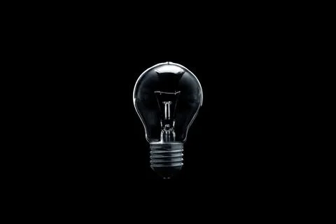 Light bulb on black background Foto stock