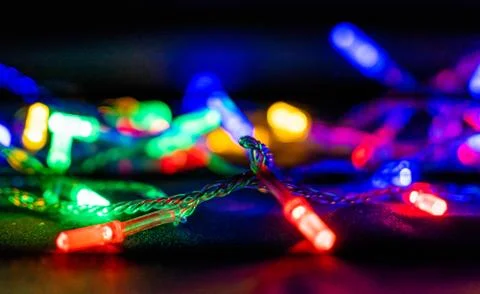 Light bulb on black background. Space for your task or message. Stock Photos