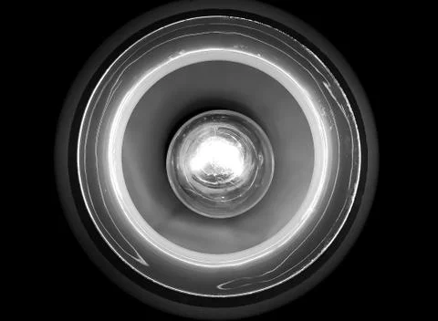 Light bulb on black bottom, light and dark Stock Photos