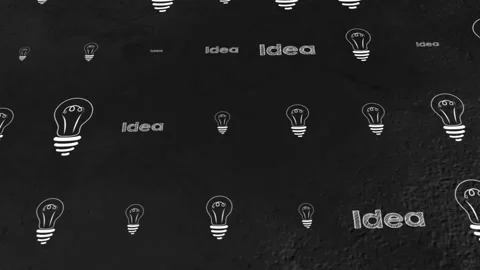 Light bulb on blackboard, an idea concept. The light bulb is drawn with chalk Stock Footage 237824801