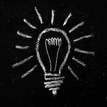 Light Bulb on Blackboard Stock Illustration