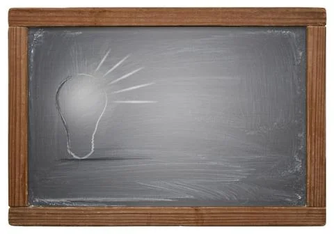 Light bulb on blackboard Stock Photos
