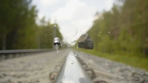 Light bulb is broken by stone on the railway in slow motion 库存影片 112689559
