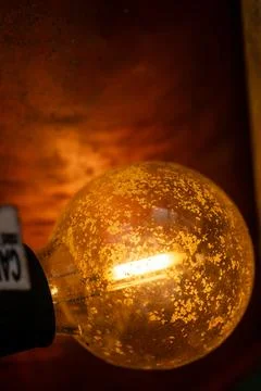 The light bulb cast warm glows in the misty mountain forest. Fotos Stock