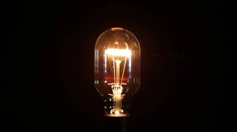 Light bulb closeup with bright turns on/off fast and slow Stock Footage