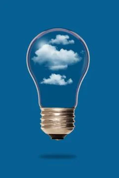 Light bulb with clouds inside Stock Photos
