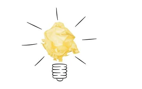 Light bulb concept made of crumpled yellow paper isolated on white 写真素材