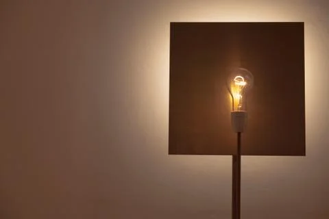 Light bulb on copper Stock Photos