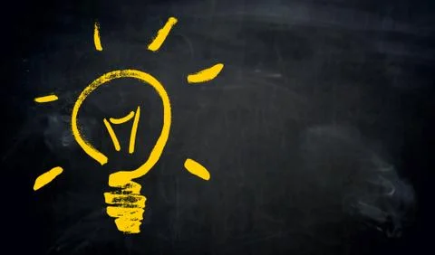 Light bulb with copyspace on blackboard painted concept Stock Illustration