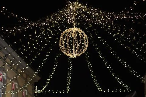 Light bulb decor, the string of lights on a dark background Stock Photos