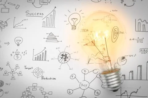 Light bulb with drawing graph.. Stock Photos
