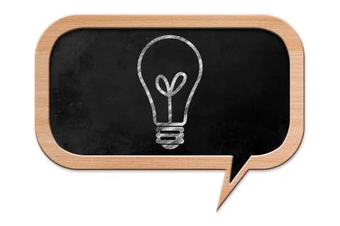 Light bulb drawn on a speech bubble shaped blackboard Illustrazione stock