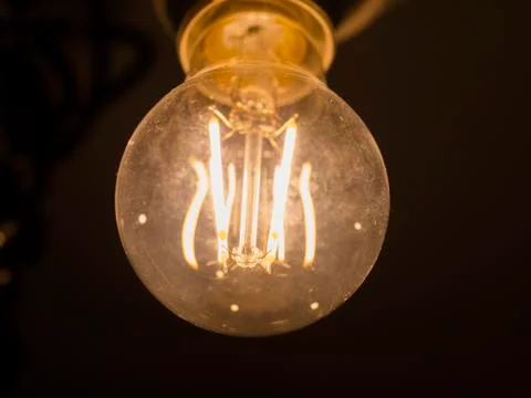 Light bulb Edison close-up. Diode lamps in the loft style room. The light in the Stock Photos