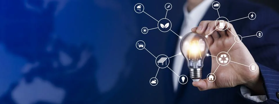 Light bulb with energy worker interface, sustainable development with renewab Stock Photos