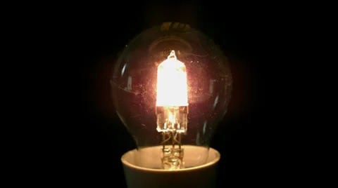 Light bulb exploding on black background Stock Footage 39637207