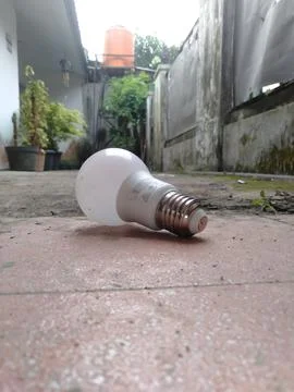 Light bulb on the floor 스톡 사진