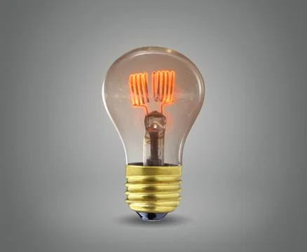Light bulb on gray background Stock Photos