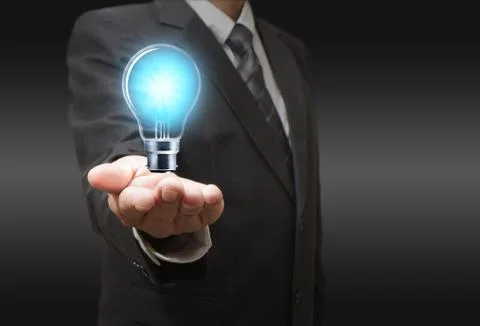 Light bulb in hand Stock Illustration