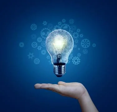 Light bulb in hand, new ideas with innovative technology and creativity. crea Stock Photos