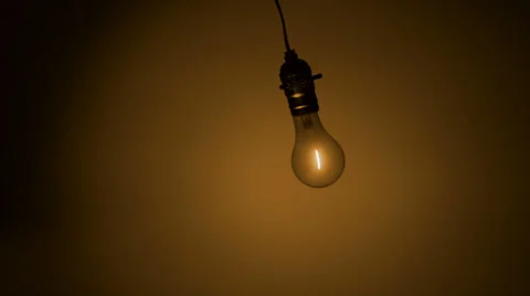 Light bulb hanging in the air, Slow Motion Stock Footage 25891777