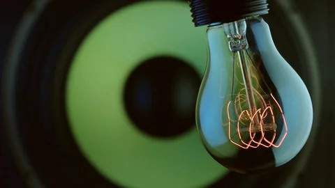 Light bulb hanging speaker frequency move left right Stock Footage 70398764