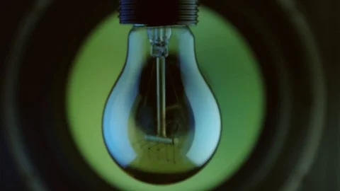 Light bulb hanging speaker frequency move close forward Stock Footage 70398787