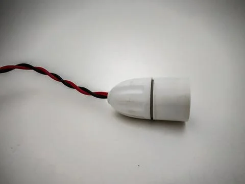Light bulb holder close up in a white background. Stock-Fotos