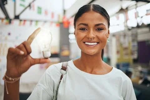 Light bulb, idea and student with classroom innovation, learning inspiration and Foto stock