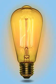 Light bulb idea. Lamp Edison retro style. Electric glow. Stock Photos