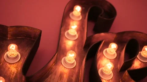 A light bulb illuminates  room, much like an idea in our mind. Red light Stock Footage 62677177