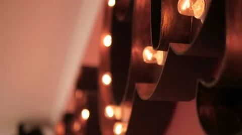 A light bulb illuminates  room, much like an idea in our mind. Red light Stock Footage 62677728