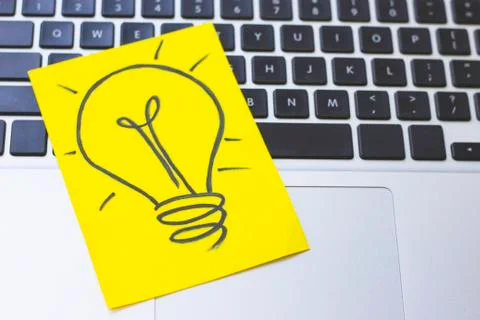 Light bulb image on a keyboard Stock Photos