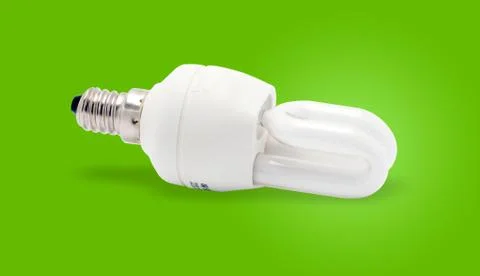 Light bulb isolated on a green background Foto stock