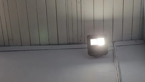 The light bulb in the LED flashlight is blinking, broken. Stock Footage 235531033