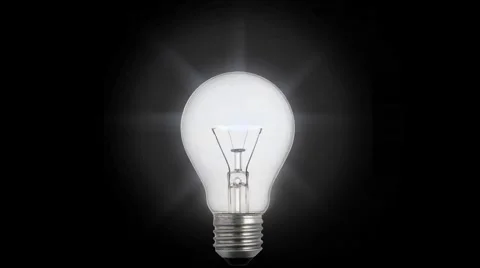 A Light Bulb Lights Up and Glows on an Stock Video Pond5