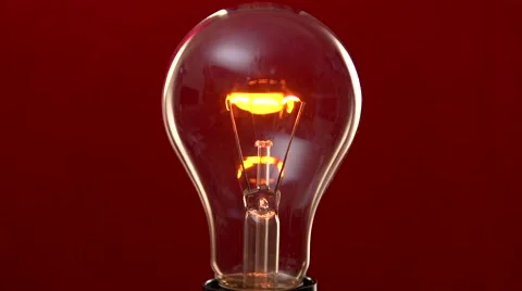 Light bulb lights up. Video stock 54937191