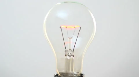 Light bulb lights up. Video stock 54937419