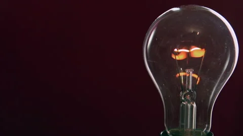 Light bulb lights up. Full HD 1080 video footage. Stock-Footage 55822231